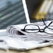 Newspaper on laptop